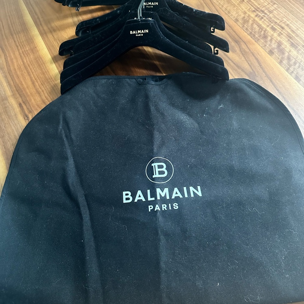 Black heavy fabric Balmain garment cover and 9 hangers